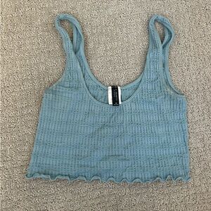 passing blue tank top